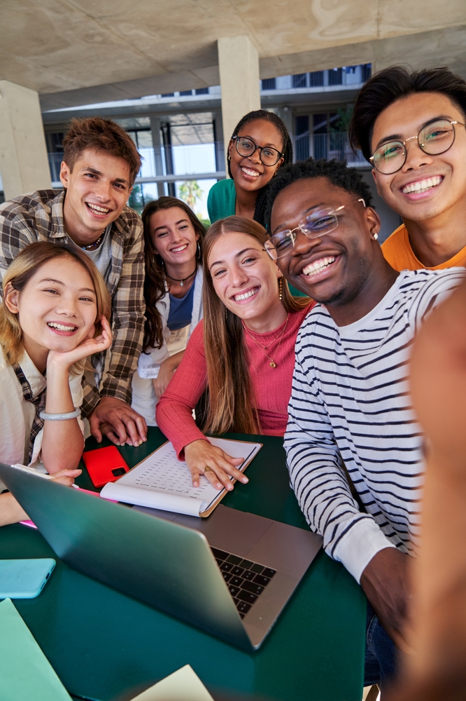 Vertical,Photo,Of,A,Group,Of,Multiracial,Students,Taking,A